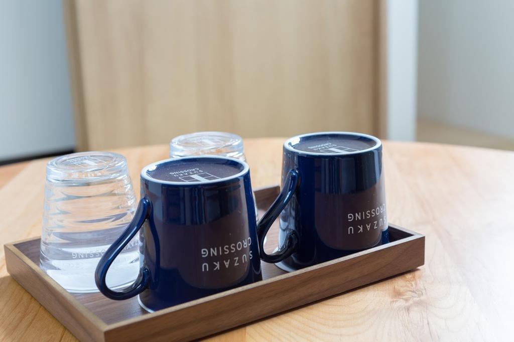 Suzakukan Suzaku Crossing 京都市 エクステリア 写真 Mugs at the airport